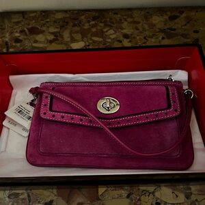 Magenta suede Coach wristlet